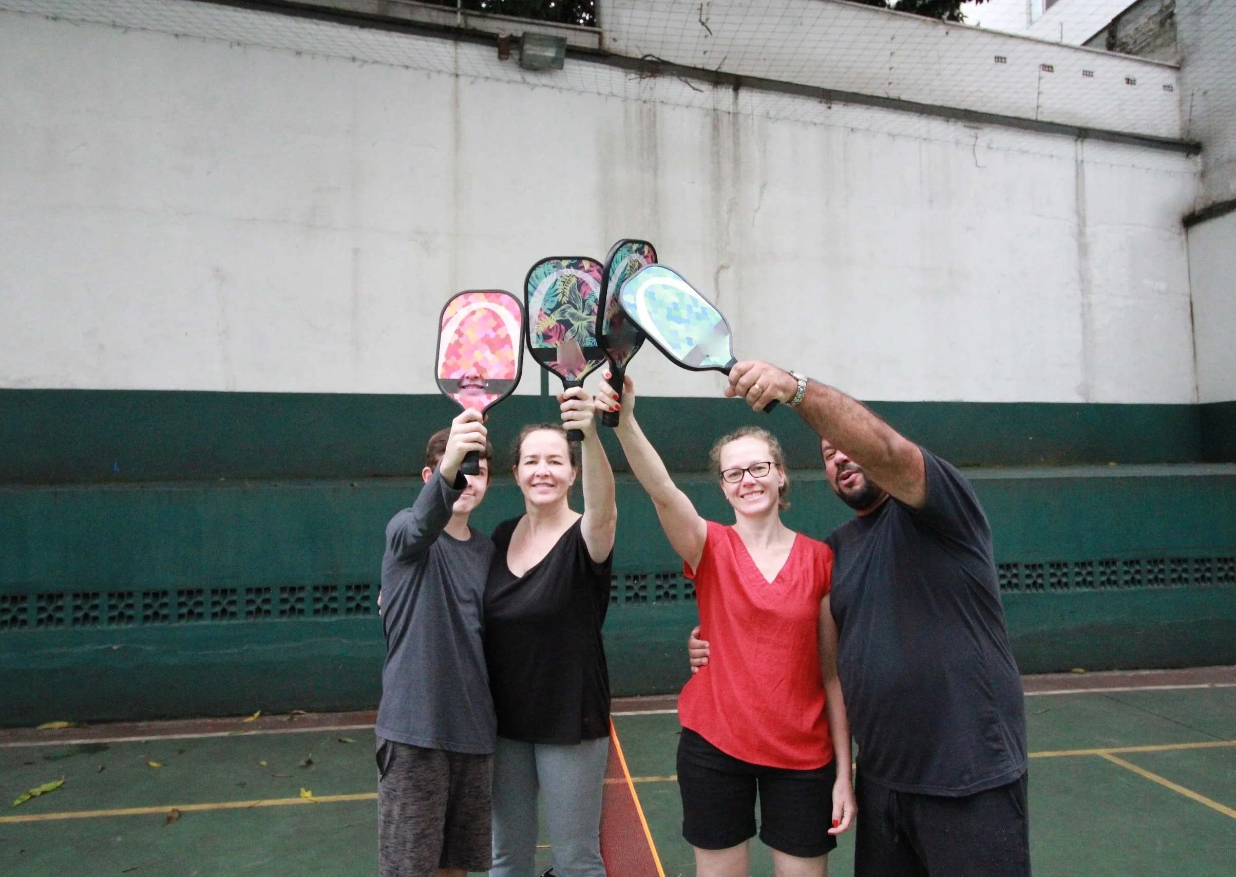 Volunteers welcoming participants at a community sports event